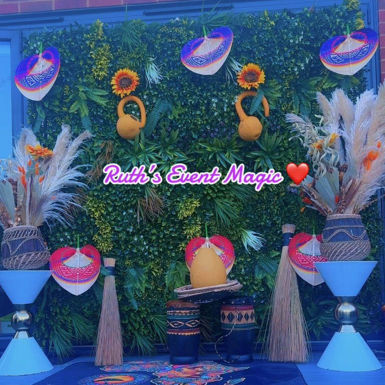 African themed backdrop Colourful decorations with flowers, and vases, creating an African backdrop.